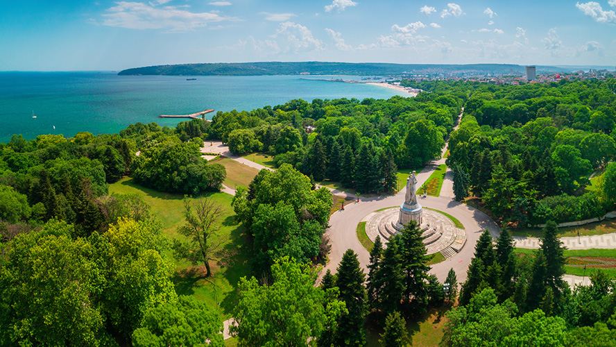 Park with a monument above the bay